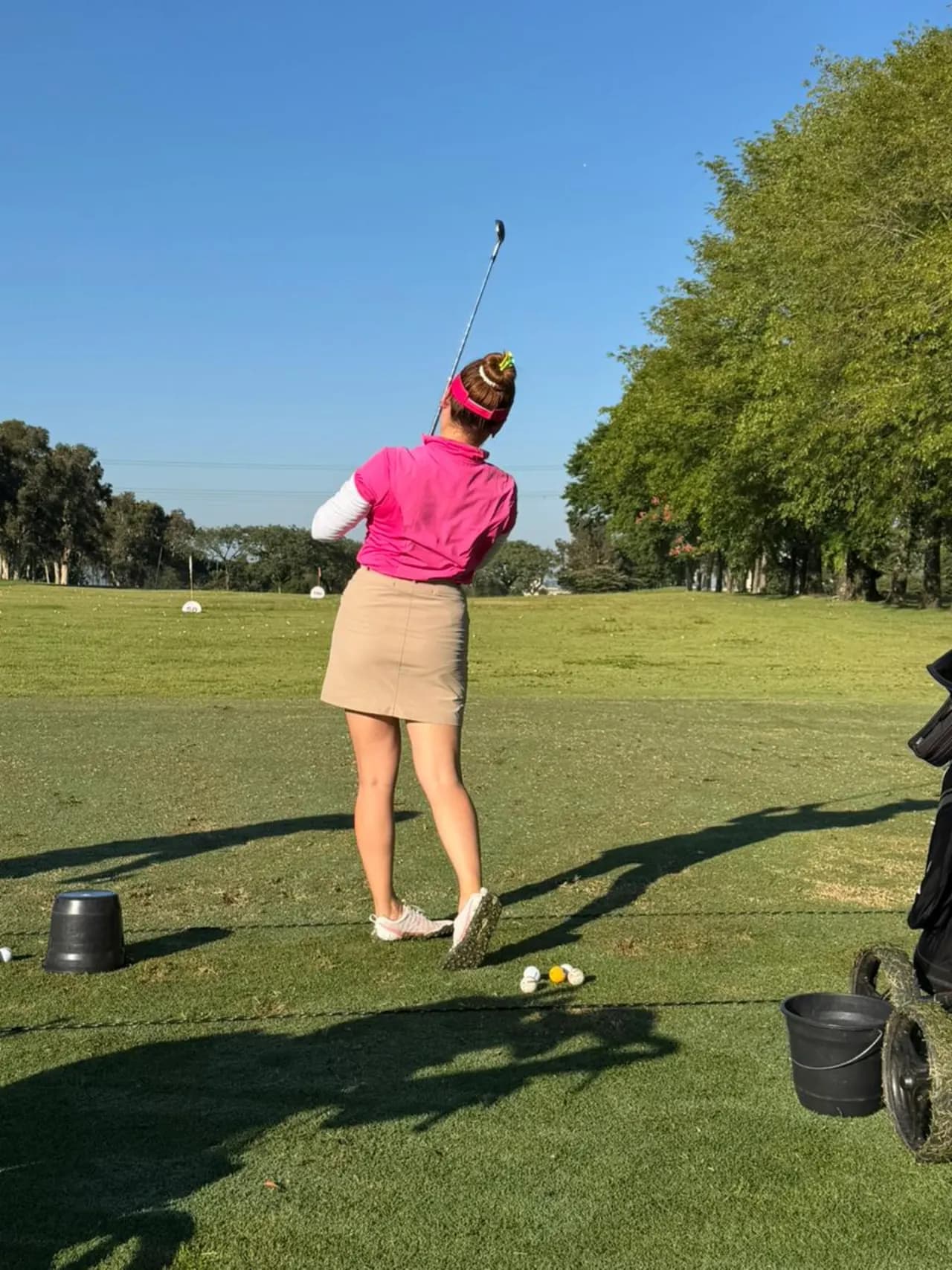 Jogadora no driving range